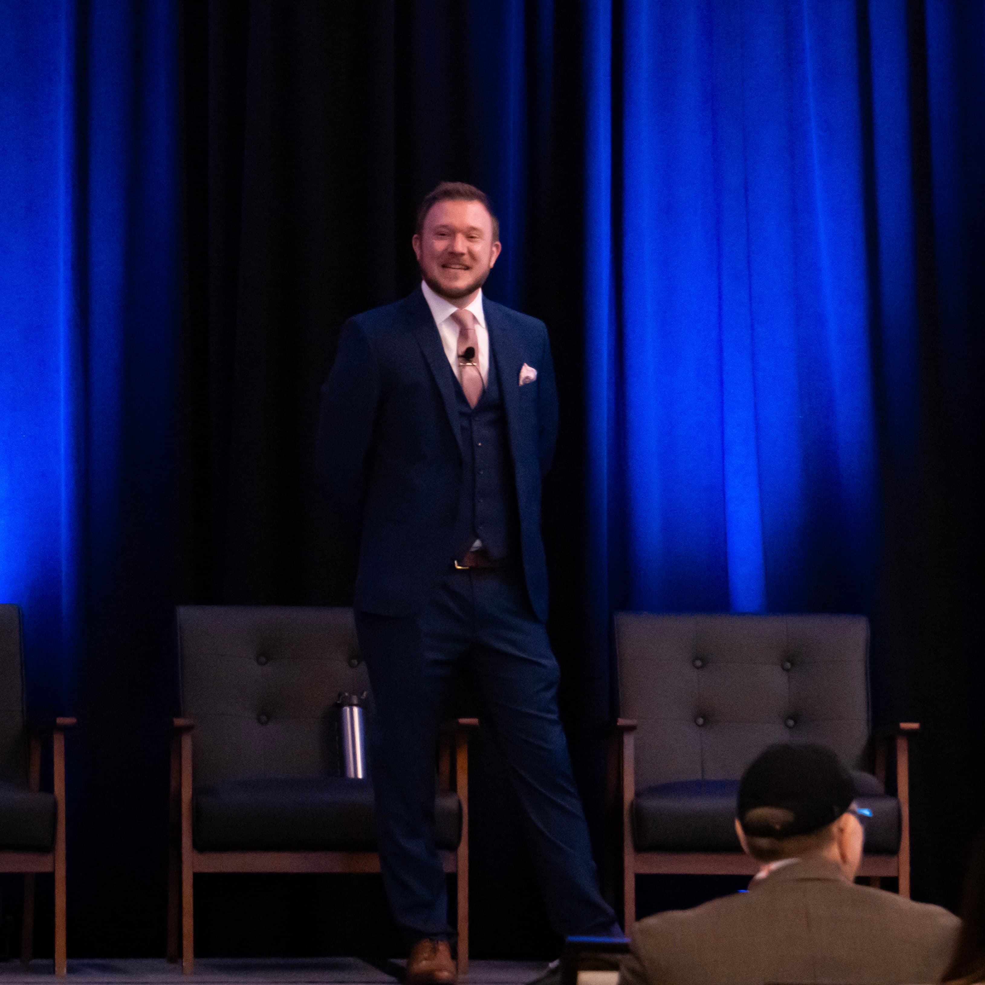Rob Jones speaking on stage